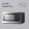 image:imageFarberware 07 Cu Ft Countertop Microwave Oven  700 Watts Power Auto Cook Settings Defrost Easy Clean and Child Safety Lock  BlackStainless Steel