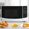 image:imageFarberware 07 Cu Ft Countertop Microwave Oven  700 Watts Power Auto Cook Settings Defrost Easy Clean and Child Safety Lock  BlackWhite