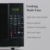 image:imageFarberware 07 Cu Ft Countertop Microwave Oven  700 Watts Power Auto Cook Settings Defrost Easy Clean and Child Safety Lock  WhiteBlack