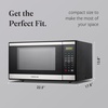 image:imageFarberware 07 Cu Ft Countertop Microwave Oven  700 Watts Power Auto Cook Settings Defrost Easy Clean and Child Safety Lock  WhiteStainless Steel