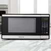 image:imageFarberware 07 Cu Ft Countertop Microwave Oven  700 Watts Power Auto Cook Settings Defrost Easy Clean and Child Safety Lock  WhiteStainless Steel