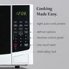 image:imageFarberware 07 Cu Ft Countertop Microwave Oven  700 Watts Power Auto Cook Settings Defrost Easy Clean and Child Safety Lock  WhiteWhite