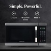 image:imageFarberware 11 Cu Ft Countertop Microwave Oven  1000 Watts Power Auto Cook Settings Defrost Easy Clean and Child Safety Lock  Stainless and BlackStainless