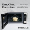 image:imageFarberware 11 Cu Ft Countertop Microwave Oven  1000 Watts Power Auto Cook Settings Defrost Easy Clean and Child Safety Lock  Stainless and BlackStainless Steel