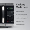 image:imageFarberware 11 Cu Ft Countertop Microwave Oven  1000 Watts Power Auto Cook Settings Defrost Easy Clean and Child Safety Lock  Stainless and BlackStainless