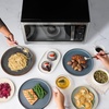 image:imageFarberware 11 Cu Ft Countertop Microwave Oven  1000 Watts Power Auto Cook Settings Defrost Easy Clean and Child Safety Lock  Stainless and BlackStainless Steel