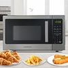 image:imageFarberware 11 Cu Ft Countertop Microwave Oven  1000 Watts Power Auto Cook Settings Defrost Easy Clean and Child Safety Lock  Stainless and BlackStainless Steel