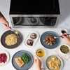 image:imageFarberware 11 Cu Ft Countertop Microwave Oven  1000 Watts Power Auto Cook Settings Defrost Easy Clean and Child Safety Lock  Stainless and BlackStainless Steel
