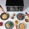 image:imageFarberware 11 Cu Ft Countertop Microwave Oven  1000 Watts Power Auto Cook Settings Defrost Easy Clean and Child Safety Lock  Stainless and BlackStainless Steel