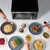 image:imageFarberware 11 Cu Ft Countertop Microwave Oven  1000 Watts Power Auto Cook Settings Defrost Easy Clean and Child Safety Lock  Stainless and BlackStainless Steel