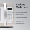image:imageFarberware 11 Cu Ft Countertop Microwave Oven  1000 Watts Power Auto Cook Settings Defrost Easy Clean and Child Safety Lock  Stainless and BlackWhite Platinum