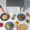 image:imageFarberware 11 Cu Ft Countertop Microwave Oven  1000 Watts Power Auto Cook Settings Defrost Easy Clean and Child Safety Lock  Stainless and BlackWhite Platinum