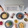 image:imageFarberware 11 Cu Ft Countertop Microwave Oven  1000 Watts Power Auto Cook Settings Defrost Easy Clean and Child Safety Lock  Stainless and BlackWhite Platinum