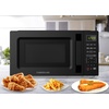 image:imageFarberware 13 Cu Ft Countertop Microwave Oven  1100 Watts Power Auto Cook Settings Defrost Easy Clean and Child Safety Lock  StainlessBlack