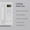 image:imageFarberware 13 Cu Ft Countertop Microwave Oven  1100 Watts Power Auto Cook Settings Defrost Easy Clean and Child Safety Lock  StainlessWhite