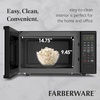 image:imageFarberware Countertop Microwave 900 Watts 09 cu ft  Microwave Oven With LED Lighting and Child Lock  Perfect for Apartments and Dorms  Easy Clean Brushed Stainless SteelBlack
