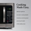 image:imageFarberware FM11WHA Microwave Oven 11 Cu Ft WhiteBlack Stainless