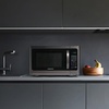 image:imageFarberware FM11WHA Microwave Oven 11 Cu Ft WhiteBlack Stainless