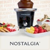 image:imageNostalgia 4 Tier Electric Chocolate Fondue Fountain Machine for Parties  Melts Cheese Queso Candy and Liqueur  Dip Strawberries Apple Wedges Vegetables and More  32Ounce  Stainless SteelBlack Fountain