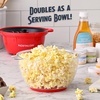 image:imageNostalgia Electric Stirring Popcorn Maker  2 Qt Capacity  Large DualPurpose Lid amp Serving Bowl  Great for Gifts Movie Nights amp Snacks  AquaRed