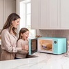 image:imageNostalgia Modern Retro Compact Countertop Microwave Oven  07 Cu Ft  700Watts with LED Digital Display  Child Lock  Easy Clean Interior  LavenderAqua