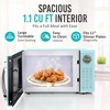 image:imageNostalgia Modern Retro Compact Countertop Microwave Oven  07 Cu Ft  700Watts with LED Digital Display  Child Lock  Easy Clean Interior  LavenderAqua