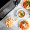 image:imageNostalgia Modern Retro Compact Countertop Microwave Oven  07 Cu Ft  700Watts with LED Digital Display  Child Lock  Easy Clean Interior  LavenderBlack