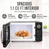 image:imageNostalgia Modern Retro Compact Countertop Microwave Oven  07 Cu Ft  700Watts with LED Digital Display  Child Lock  Easy Clean Interior  LavenderBlack