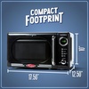 image:imageNostalgia Modern Retro Compact Countertop Microwave Oven  07 Cu Ft  700Watts with LED Digital Display  Child Lock  Easy Clean Interior  LavenderBlack