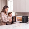 image:imageNostalgia Modern Retro Compact Countertop Microwave Oven  07 Cu Ft  700Watts with LED Digital Display  Child Lock  Easy Clean Interior  LavenderBlack