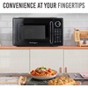 image:imageNostalgia Modern Retro Compact Countertop Microwave Oven  07 Cu Ft  700Watts with LED Digital Display  Child Lock  Easy Clean Interior  LavenderBlack