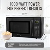 image:imageNostalgia Modern Retro Compact Countertop Microwave Oven  07 Cu Ft  700Watts with LED Digital Display  Child Lock  Easy Clean Interior  LavenderBlack