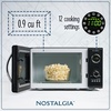 image:imageNostalgia Modern Retro Compact Countertop Microwave Oven  07 Cu Ft  700Watts with LED Digital Display  Child Lock  Easy Clean Interior  LavenderBlack