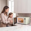 image:imageNostalgia Modern Retro Compact Countertop Microwave Oven  07 Cu Ft  700Watts with LED Digital Display  Child Lock  Easy Clean Interior  LavenderIvory