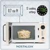 image:imageNostalgia Modern Retro Compact Countertop Microwave Oven  07 Cu Ft  700Watts with LED Digital Display  Child Lock  Easy Clean Interior  LavenderIvory
