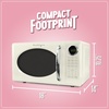 image:imageNostalgia Modern Retro Compact Countertop Microwave Oven  07 Cu Ft  700Watts with LED Digital Display  Child Lock  Easy Clean Interior  LavenderIvory