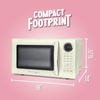 image:imageNostalgia Modern Retro Compact Countertop Microwave Oven  07 Cu Ft  700Watts with LED Digital Display  Child Lock  Easy Clean Interior  LavenderIvory