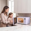 image:imageNostalgia Modern Retro Compact Countertop Microwave Oven  07 Cu Ft  700Watts with LED Digital Display  Child Lock  Easy Clean Interior  LavenderLavender