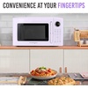image:imageNostalgia Modern Retro Compact Countertop Microwave Oven  07 Cu Ft  700Watts with LED Digital Display  Child Lock  Easy Clean Interior  LavenderLavender