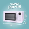 image:imageNostalgia Modern Retro Compact Countertop Microwave Oven  07 Cu Ft  700Watts with LED Digital Display  Child Lock  Easy Clean Interior  LavenderLavender