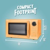 image:imageNostalgia Modern Retro Compact Countertop Microwave Oven  07 Cu Ft  700Watts with LED Digital Display  Child Lock  Easy Clean Interior  LavenderOrange