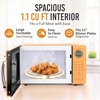 image:imageNostalgia Modern Retro Compact Countertop Microwave Oven  07 Cu Ft  700Watts with LED Digital Display  Child Lock  Easy Clean Interior  LavenderOrange