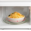 image:imageNostalgia Modern Retro Compact Countertop Microwave Oven  07 Cu Ft  700Watts with LED Digital Display  Child Lock  Easy Clean Interior  LavenderPink