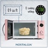 image:imageNostalgia Modern Retro Compact Countertop Microwave Oven  07 Cu Ft  700Watts with LED Digital Display  Child Lock  Easy Clean Interior  LavenderPink