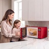 image:imageNostalgia Modern Retro Compact Countertop Microwave Oven  07 Cu Ft  700Watts with LED Digital Display  Child Lock  Easy Clean Interior  LavenderRed