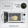 image:imageNostalgia Modern Retro Compact Countertop Microwave Oven  07 Cu Ft  700Watts with LED Digital Display  Child Lock  Easy Clean Interior  LavenderWhite