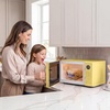 image:imageNostalgia Modern Retro Compact Countertop Microwave Oven  07 Cu Ft  700Watts with LED Digital Display  Child Lock  Easy Clean Interior  LavenderYellow