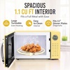 image:imageNostalgia Modern Retro Compact Countertop Microwave Oven  07 Cu Ft  700Watts with LED Digital Display  Child Lock  Easy Clean Interior  LavenderYellow