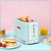 image:imageNostalgia New and Improved Wide 2Slice Toaster Perfect For Bread English Muffins Bagels 5 Browning Levels With Crumb Tray amp Cord Storage AquaAqua