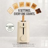 image:imageNostalgia Slim 2Slice Toaster  Wide Slot  SpaceSaving Design  Adjustable Browning Dial  10inch Long Slot Fits 2 Slices of Bread or Bagel Halves  Dropdown Crumb Tray  BlackberryOatmeal